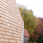 Lärchenholzschindeln <br><a href='../html/img/pool/Bauwerk_Lechner_RGL_Windturm_Schindeldach.jpg' target='_blank'>Vollbild anzeigen</a>
